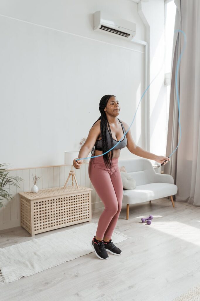 A Woman Using a Skip Rope at Home